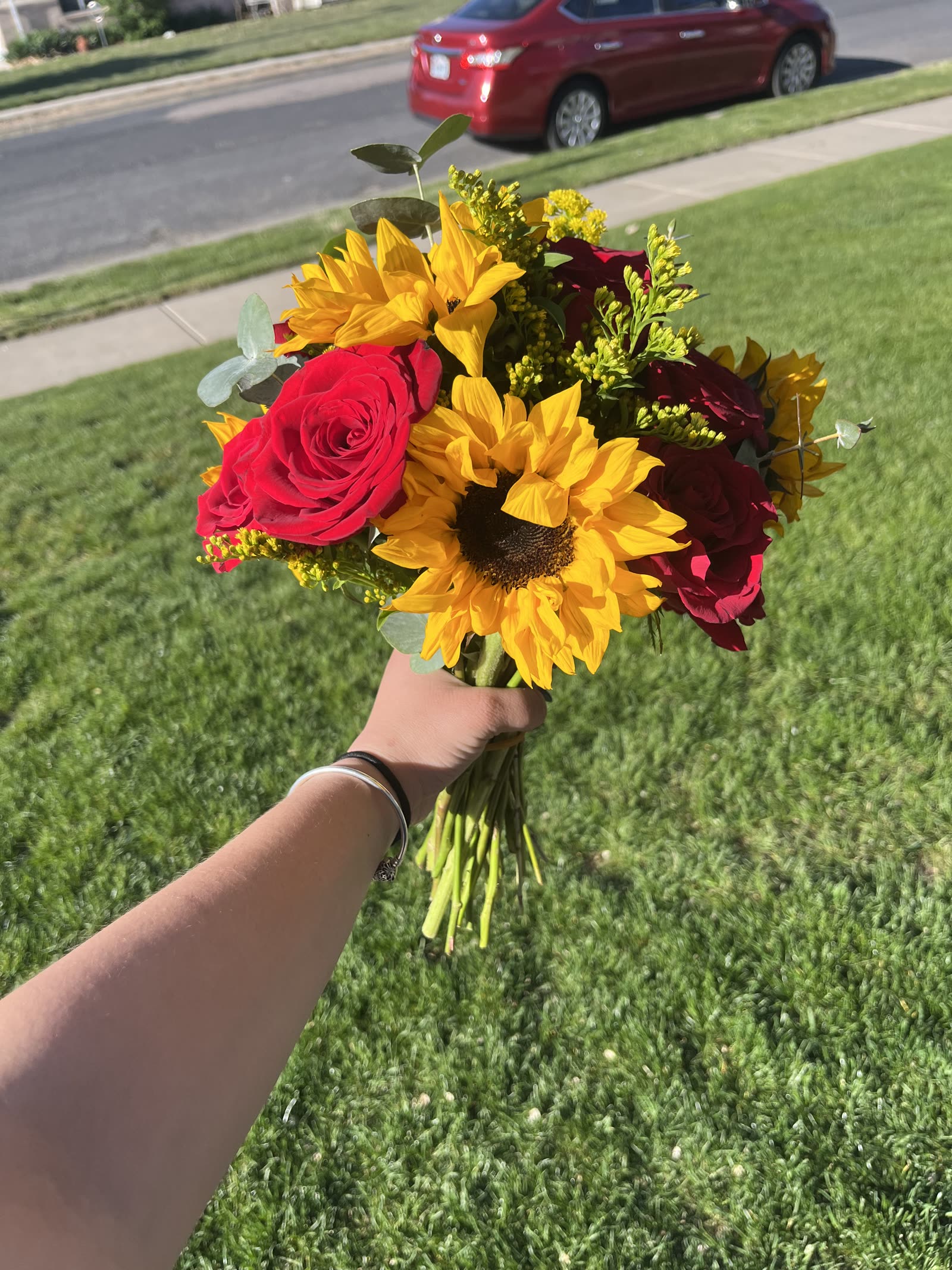 Sunflower and red rose bouquet by Leah